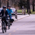 two girl do a cycling